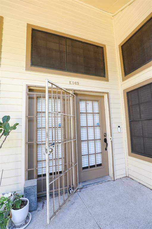 Covered balcony at the front door creates an inviting entrance.