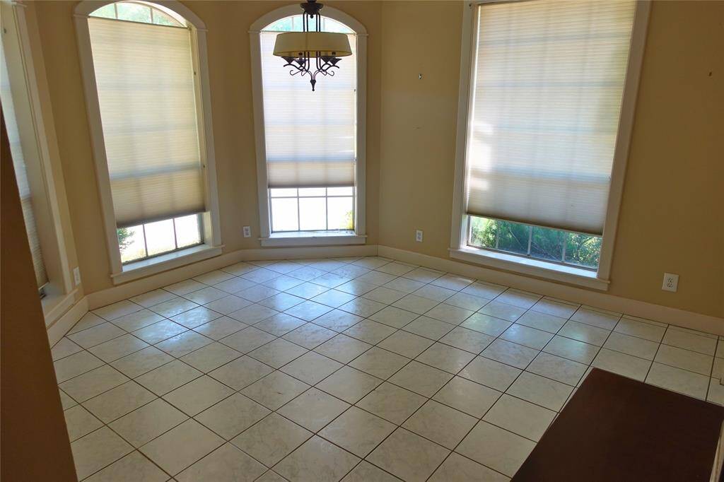 Bright Breakfast Nook with Bay Windows