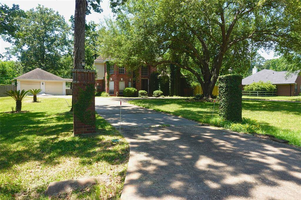 Long Private Driveway with Mature Trees