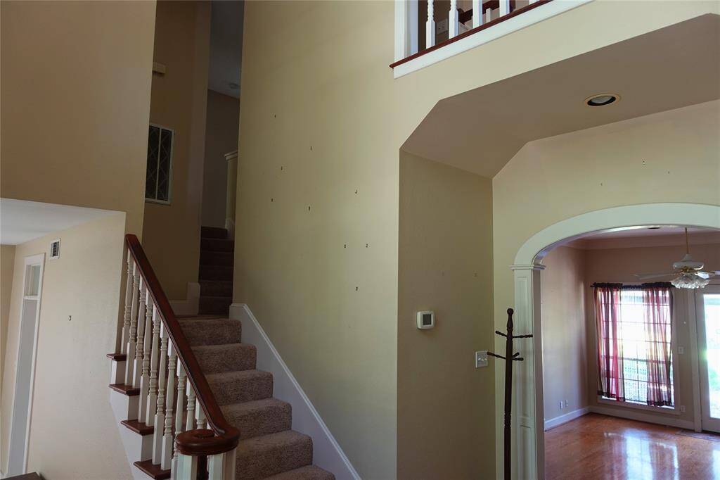 Stairway Landing and Open Upstairs Loft View
