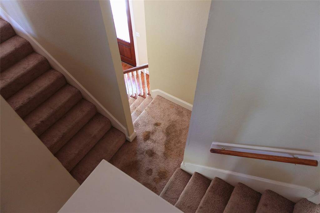 Dual Stairwell Entry with Natural Light