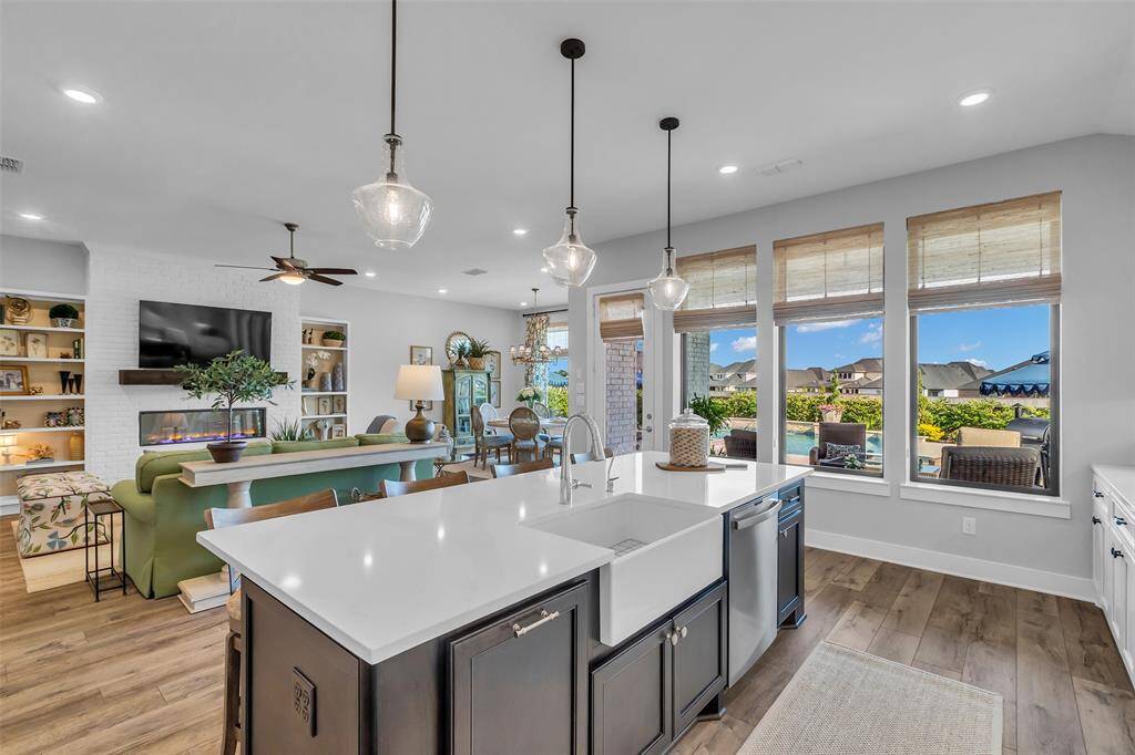 The cook can always be part of the action all while enjoying the stunning backyard view.
