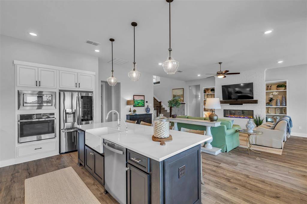 Updated pendant lighting provides the perfect kitchen accent.