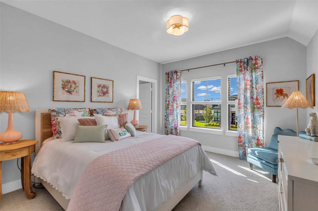Upstairs is the first of three secondary bedrooms. This one with an ensuite bathroom.