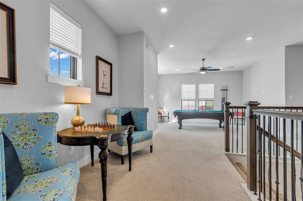 Oversized space can be used as a sitting area or student desk/study area.
