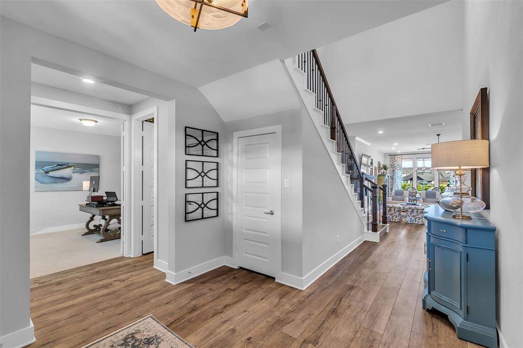 Step into this meticulously kept home's gallery style foyer.