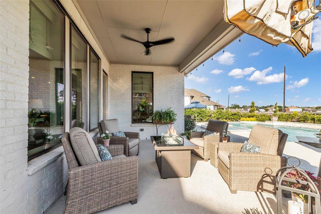Back downstairs, step out into your backyard oasis. Covered patio, plumbed for gas, is a great space for entertaining or simply to unwind.