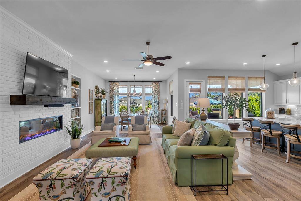 The open concept family room, kitchen, and dining area.