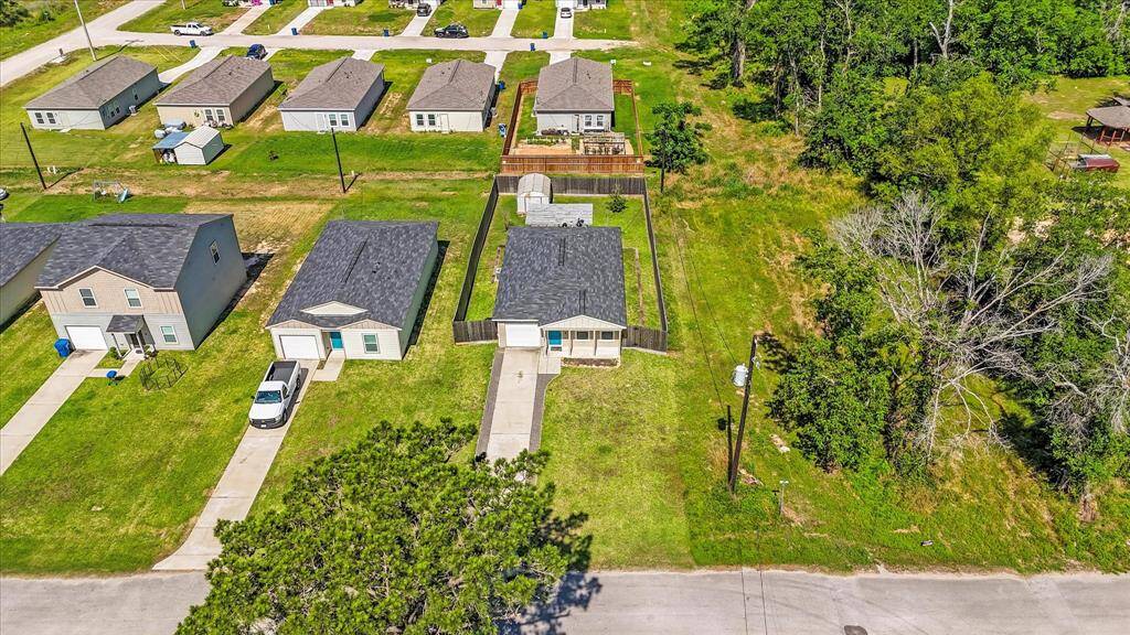Aerial view of the hone siding to green space