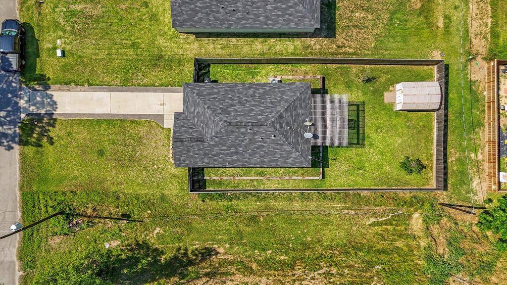 Aerial view of the home situated on the lot