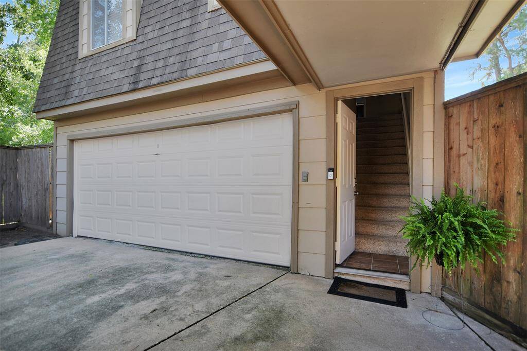 Tucked above a spacious detached garage, is a studio garage apartment.