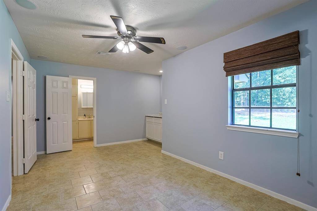 Large second room with a nook for storage