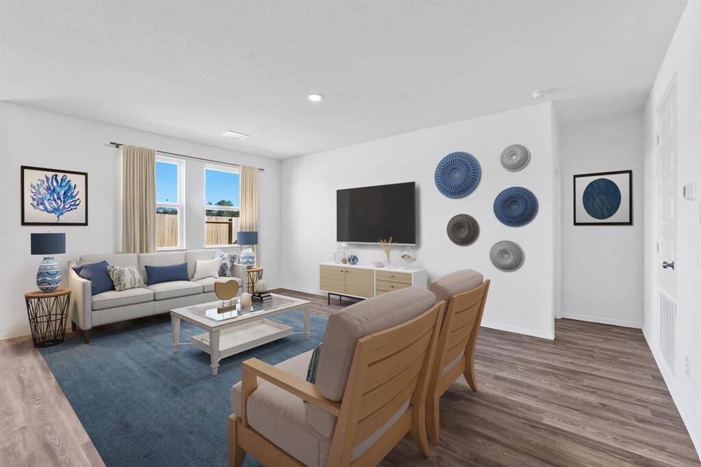 Virtually Staged Living area. The passage way to the right leads to the Primary suite.