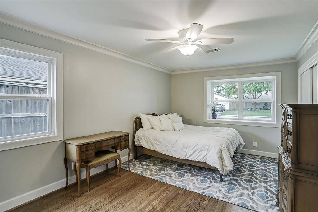One of three secondary bedrooms, this room has an attached full bath.
