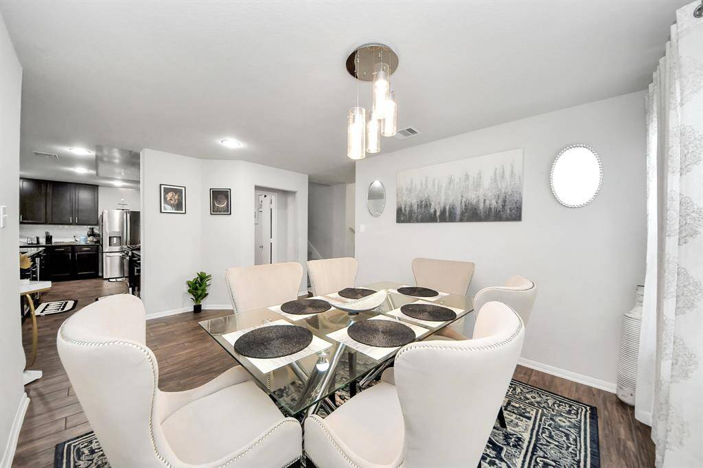 Open-concept dining area with easy flow to kitchen and living.