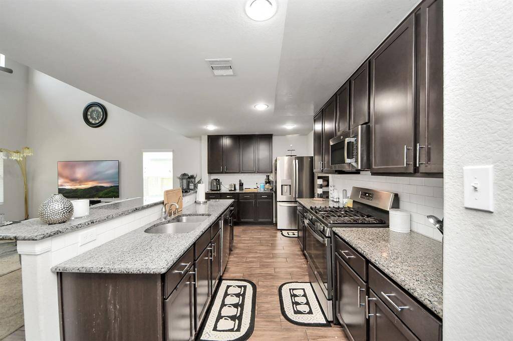 Open-concept dining area with easy flow to kitchen and living.