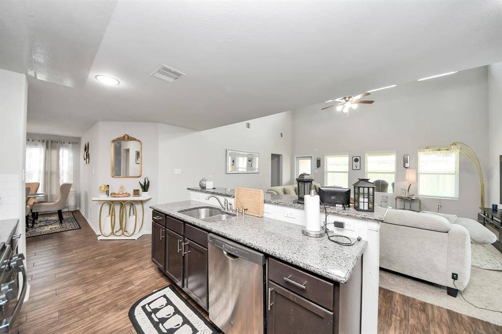 Kitchen design opens beautifully into main living area for flexible use.