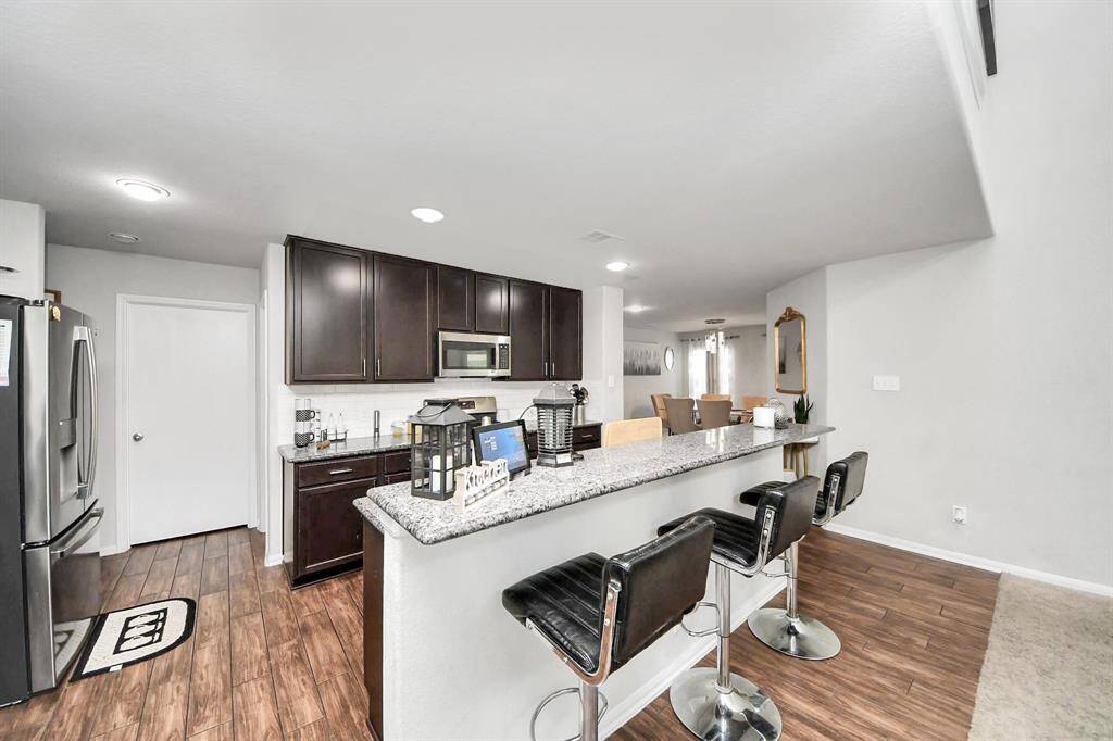 Full view of kitchen highlighting prep space and modern layout