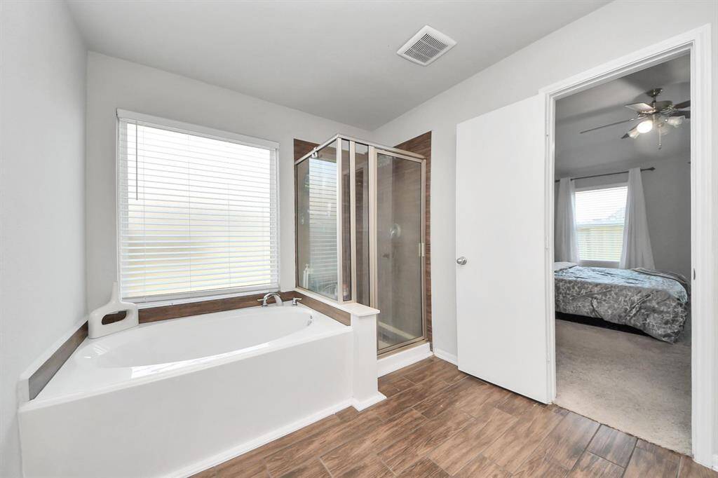 Expansive upstairs game room or second living space, ideal for entertainment or lounge area.