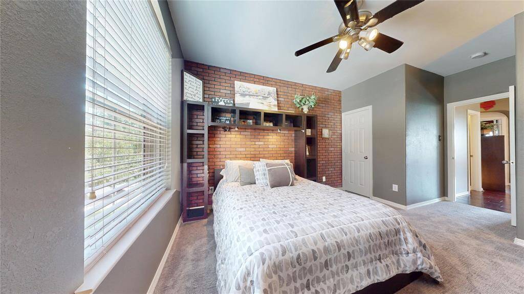 Each of the spacious secondary bedrooms offers comfort and functionality, featuring walk-in closets and brand new carpet for a fresh, updated feel.