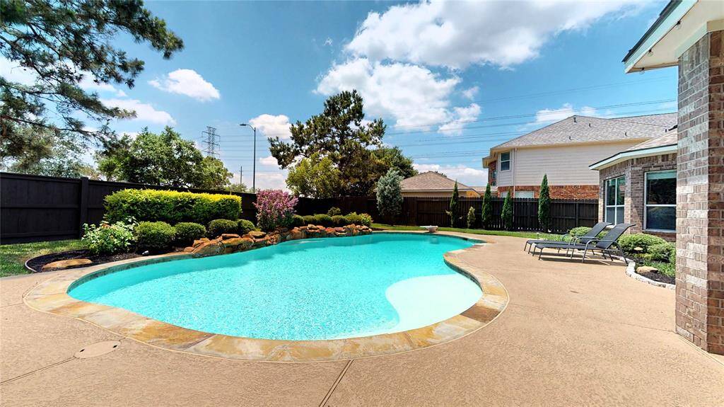 Notable upgrades include recently replaced pool equipment (2023), an updated pool deck (2023), and a new privacy fence (2021). With no back neighbors, you'll enjoy added peace and seclusion in this beautifully maintained space.