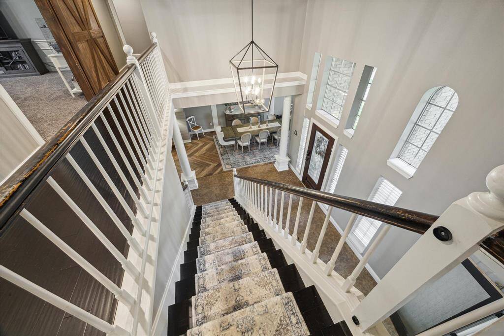 The stairway adds character and connects the home with ease and elegance.