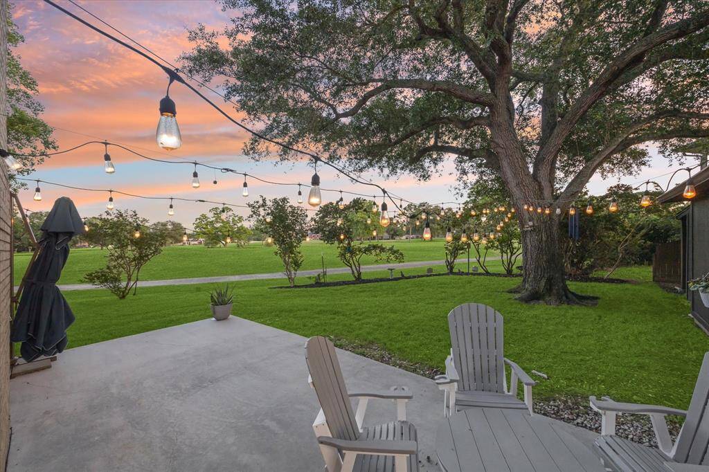 Enjoy stunning golf course views from your porch, enhanced by charming string lighting that creates a cozy, inviting atmosphere for evening relaxation or entertaining.