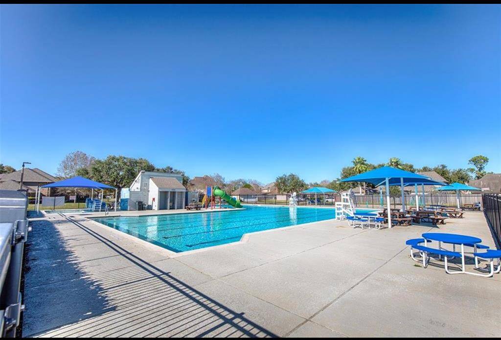 The recreation features a large pool with slides just in time for summer!