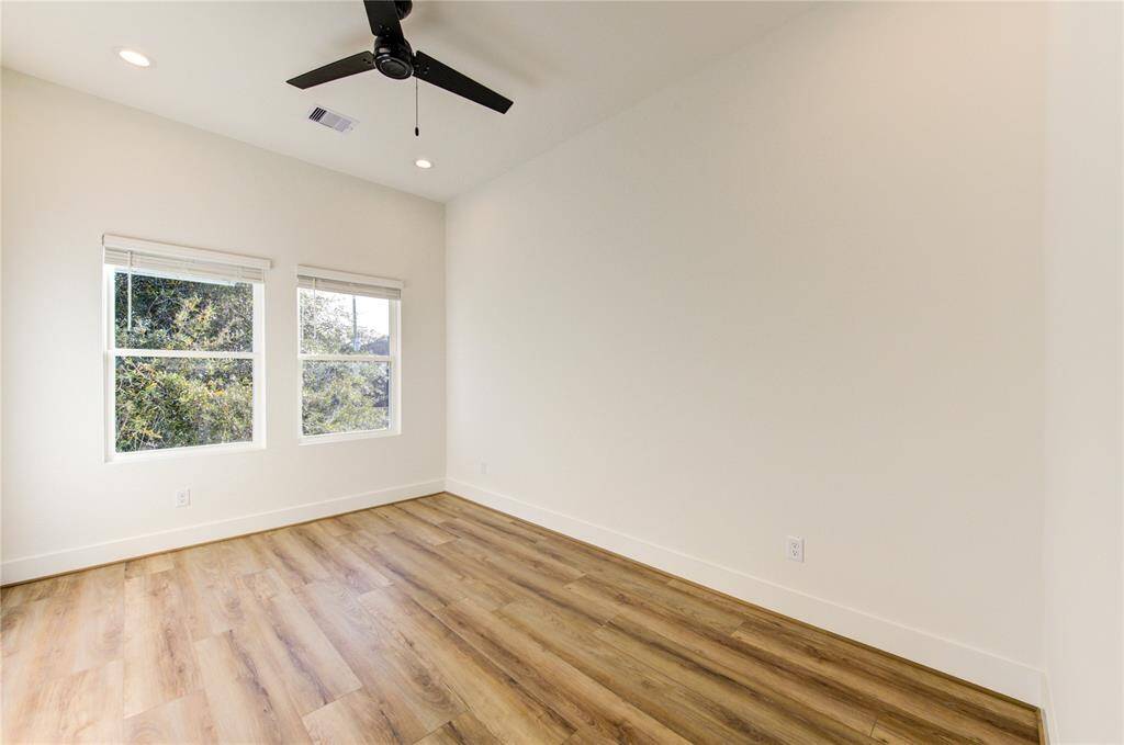 Bedroom 2. All bedroom feature ceiling fans pre-installed, LED recessed lighting, and large closets.