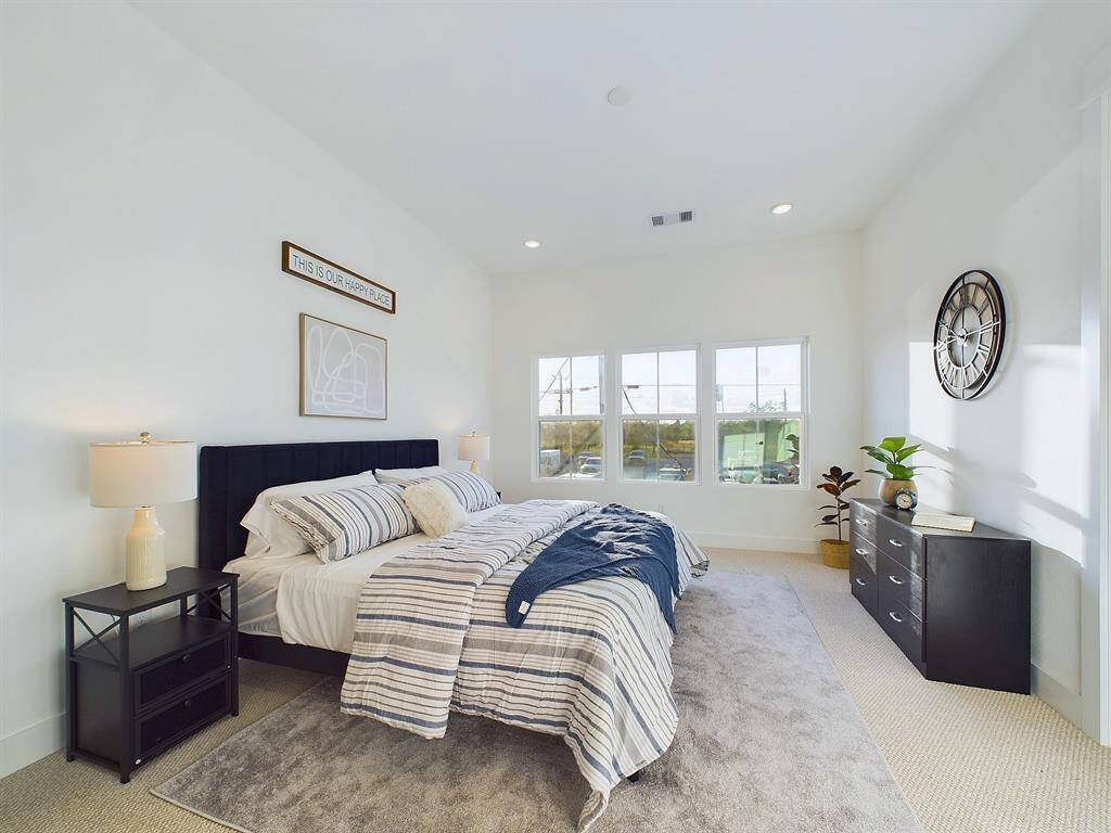 This spacious primary room is located on the second floor, big windows allow in lots of natural lighting. FINISHES & FLOOR PLANS WILL VARY! Ceiling fans are not included!