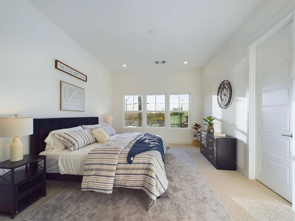 This spacious primary room is located on the second floor, big windows allow in lots of natural lighting. FINISHES & FLOOR PLANS WILL VARY! Ceiling fans are not included!