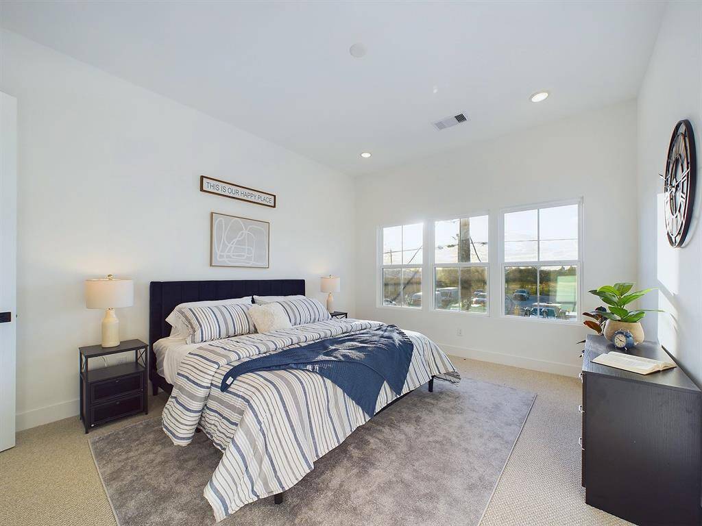 This spacious primary room is located on the second floor, big windows allow in lots of natural lighting. FINISHES & FLOOR PLANS WILL VARY! Ceiling fans are not included!