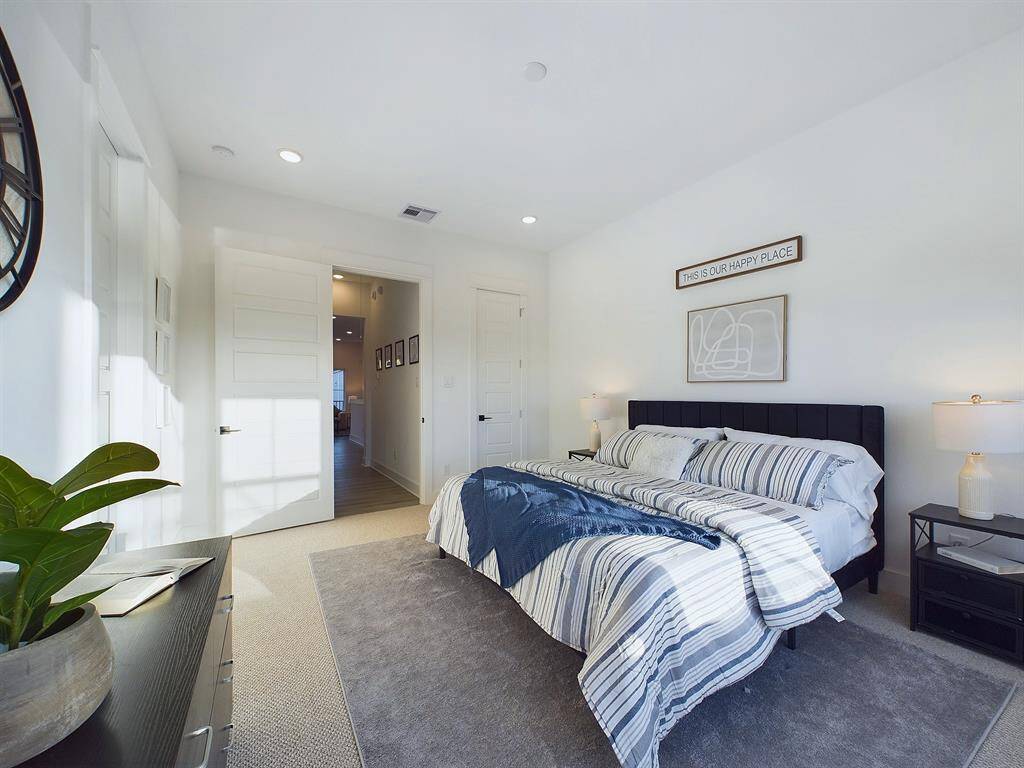 This spacious primary room is located on the second floor, big windows allow in lots of natural lighting. FINISHES & FLOOR PLANS WILL VARY! Ceiling fans are not included!
