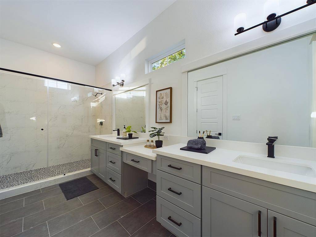 Offering a beautiful primary bathroom with a walk-in shower and double sink vanity. FINISHES & FLOOR PLANS WILL VARY!