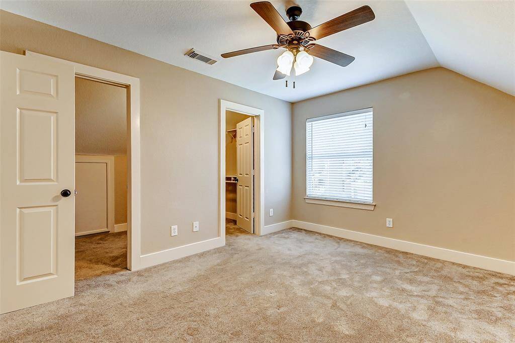 Designed with attention to detail,the additional bedrooms all offercozy retreats for family membersor guests, each adorned with itsunique character and style. Takenote of the ceiling fan, plushcarpet, and window!