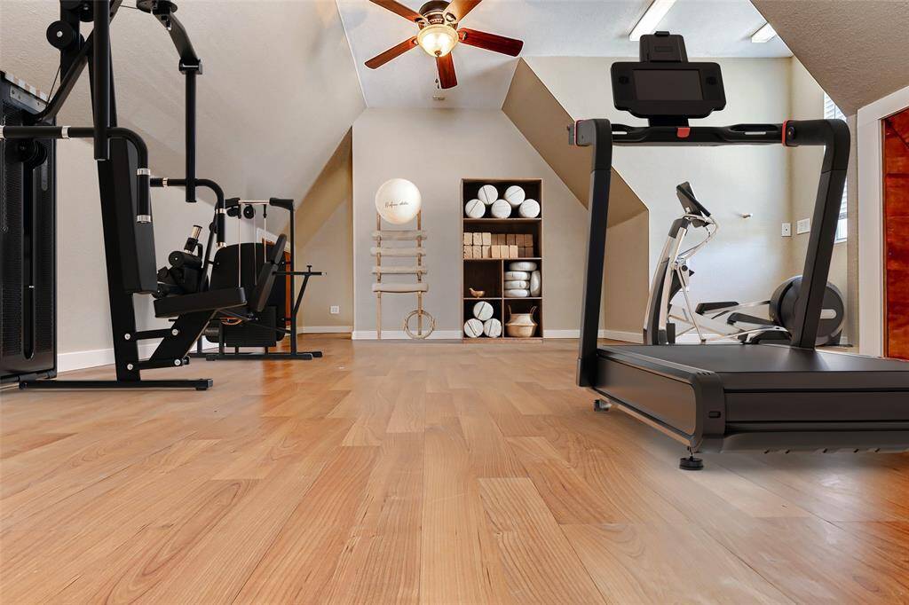 This charming upstairs room isthe perfect retreat for visitors.The large windows and ceilingfans create a comfortable andinviting space.  *Virtually Staged