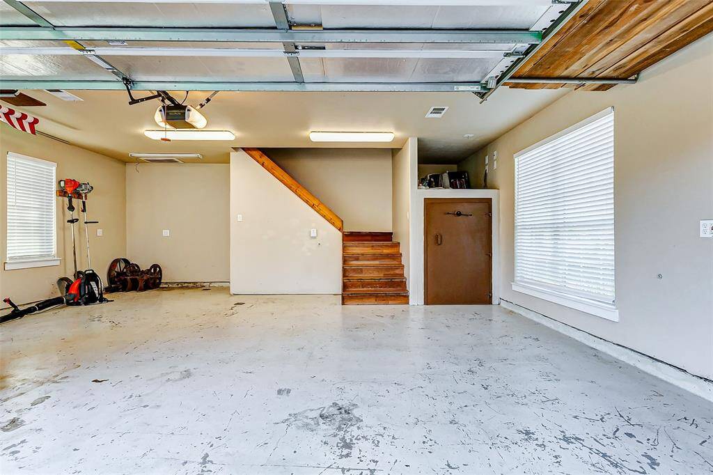 Welcome to the first of two thoughtfully designed two-car garages. This AIR CONDITIONED garage in particular is detached from the home and offers an apartment upstairs and a half bathroom downstairs. Also on the first level is a built in safe!