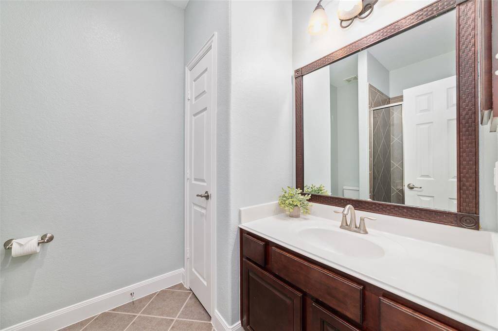 Full bathroom with walk in shower for the back bedroom and also accessible for guests.