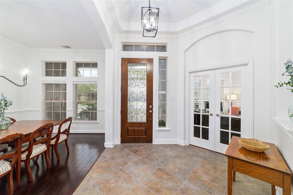 French doors lead to the office at the front of the home.