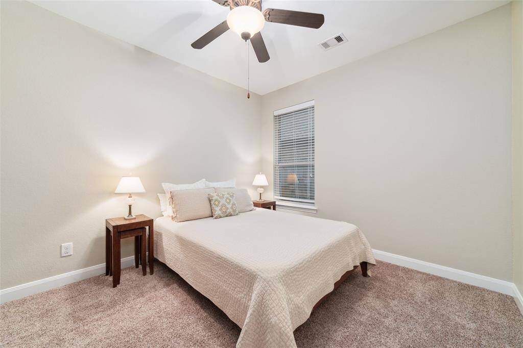 Just past the office are two secondary bedrooms and a full bathroom.  This is the first of 2 bedrooms towards the front of the home.