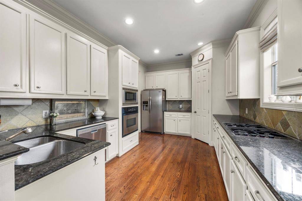 Large kitchen with new stainless steel appliances