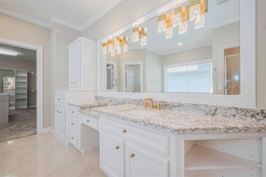 Spacious primary bathroom, his & her sinks