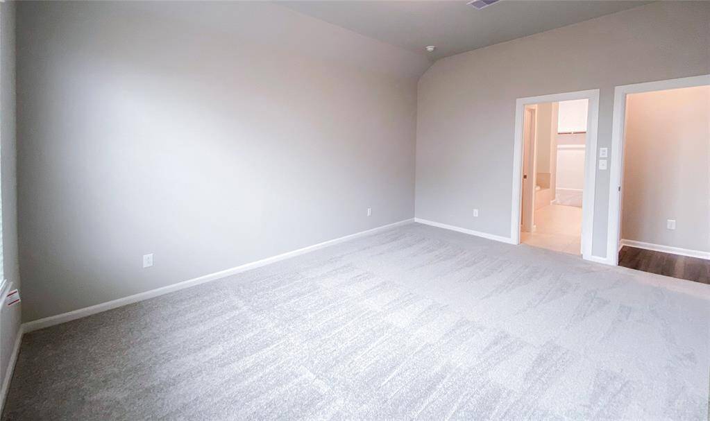 Spacious master bedroom with sitting area
