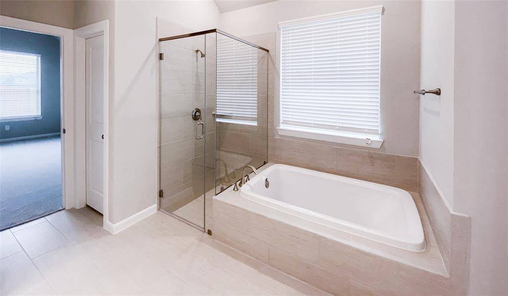 Separate walk-in shower and tub