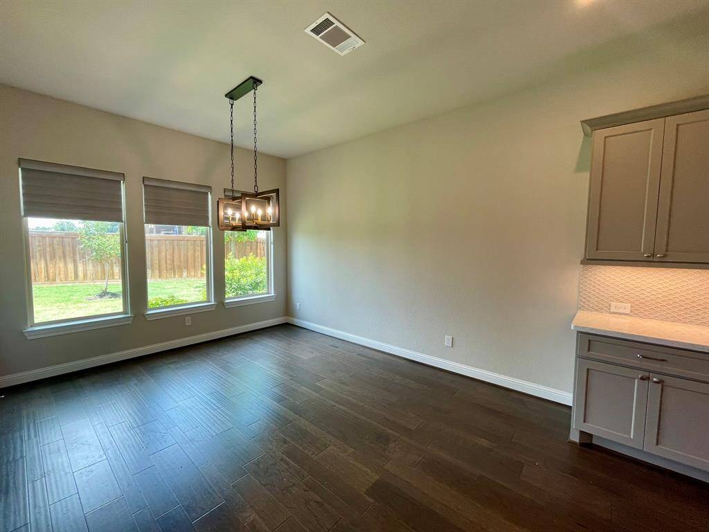This space would fit either a round, square or rectangle table - endless possibilities.