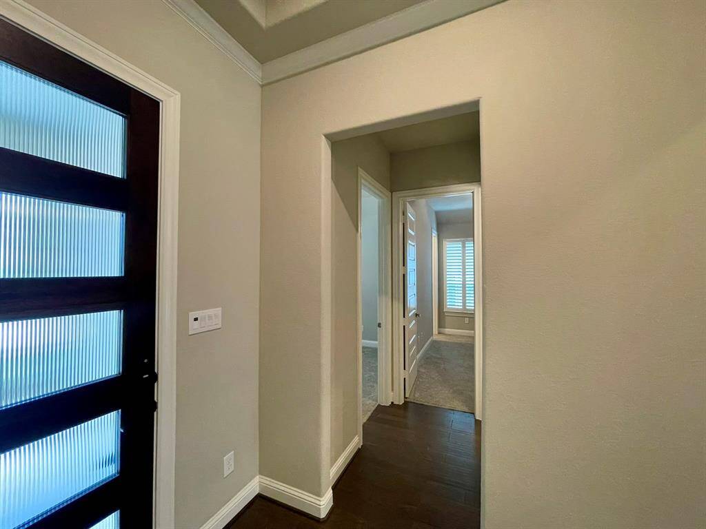 Back at the front of the home - two secondary Bedrooms and a Full Bathroom share this wing.
