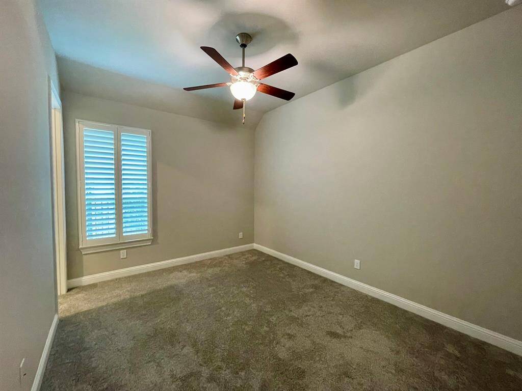 The other Bedroom which shares this Hallway with another Secondary Bedroom.