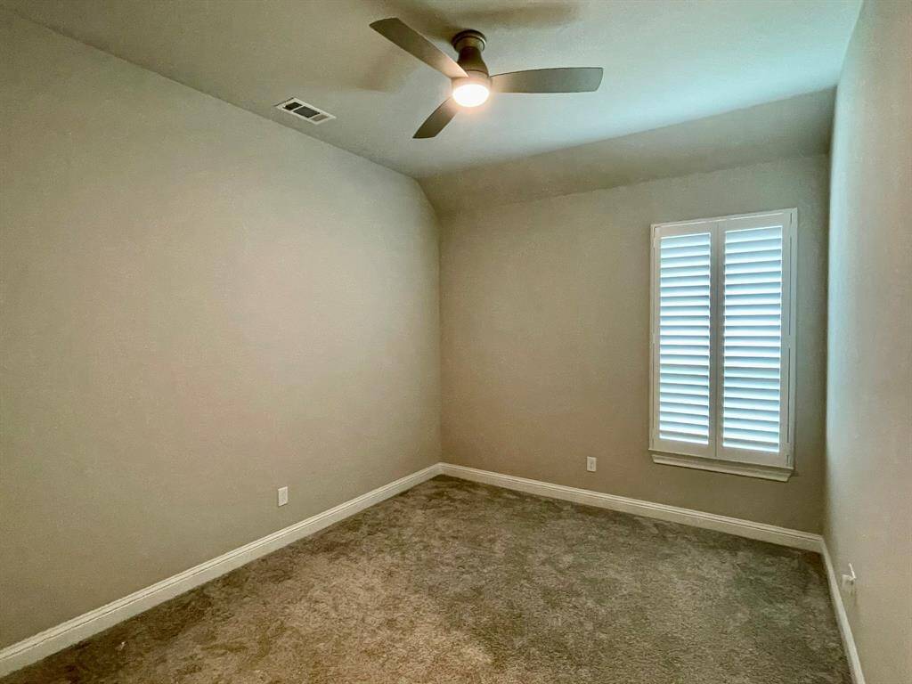 Just the next hallway down from the study is a Secondary Bedroom Suite.  Perfect for a Guest Room.