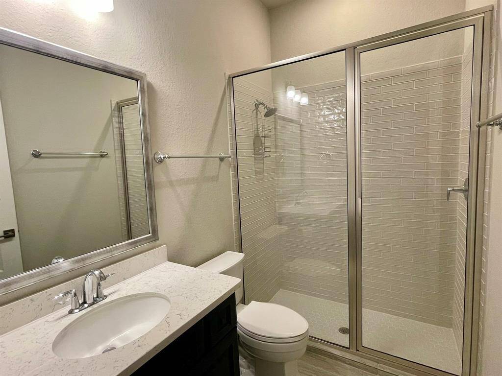 Walk In Shower rounds out this space.