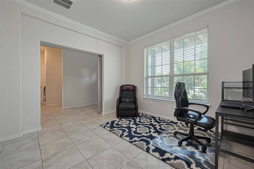 This dedicated office area offers a quiet, functional retreat ideal for working from home, managing daily tasks, or serving as a study zone. With ample natural light, neutral tones, and a thoughtful layout, it’s both productive and inviting